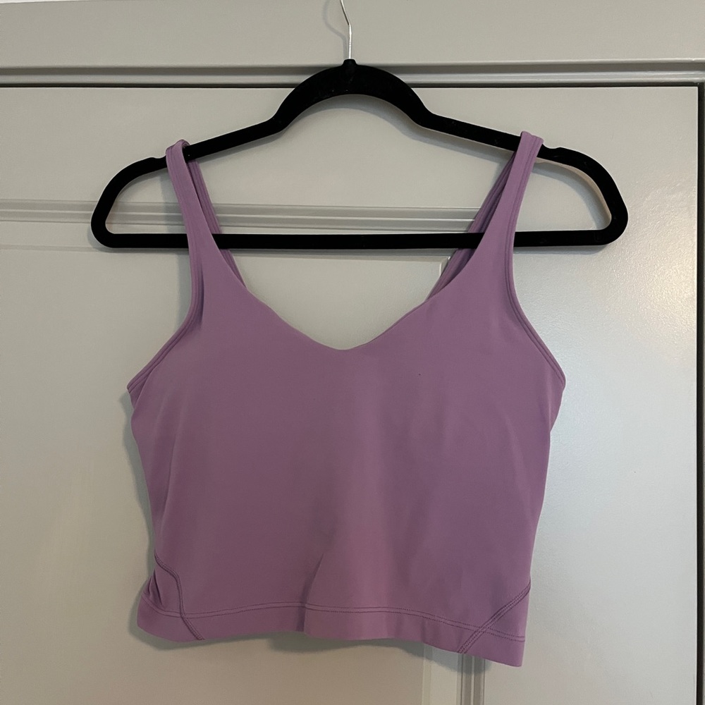 Align tank in purple no longer sold in stores. Built in bra and great condition